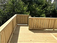 <b>Pressure Treated Wood Deck with Custom Wood Railing</b>